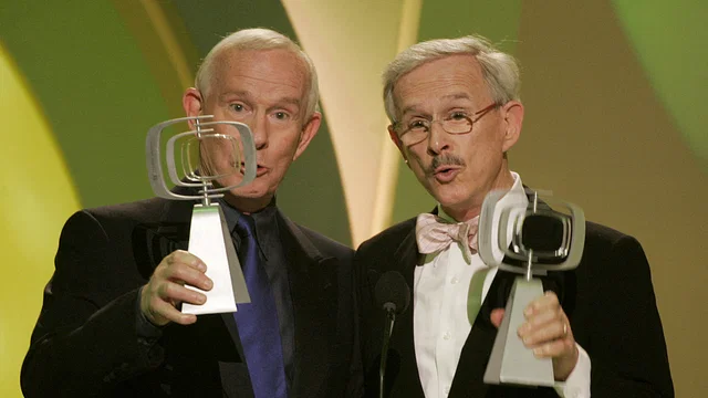 Tom (left) and Dick Smothers, the comedic siblings and stars of the television series 'The Smothers Brothers Comedy Show,' graciously accept the Favorite Singing Siblings award at the 3rd annual TV Land Awards in Santa Monica, California, on March 13, 2005.